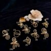a little askew stackable brass rings